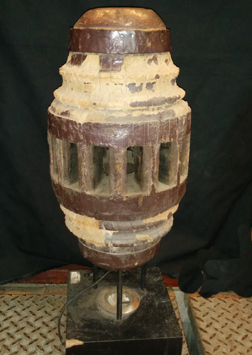 Ancient axle used as a lamp