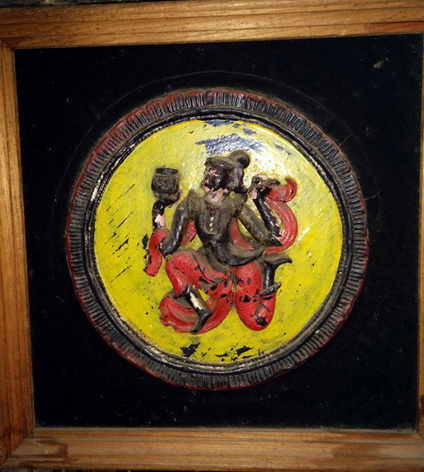 Framed buddhist wood carving