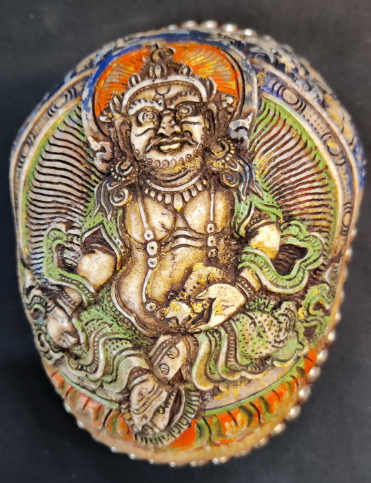 Tantric kapala, skull cap, carved